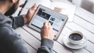 Man searching internet for Church