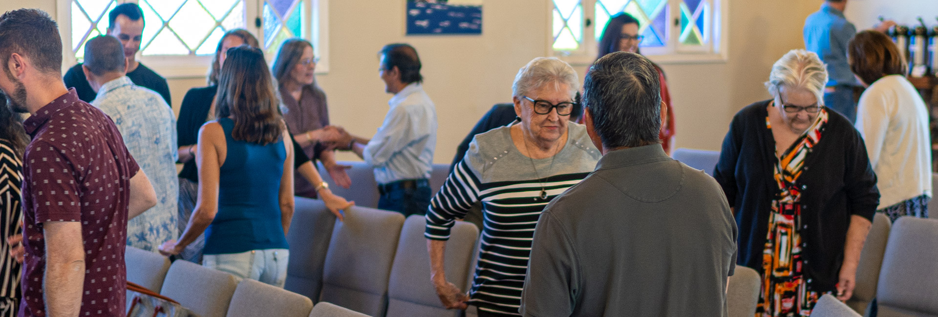 Church members during service greeting one another