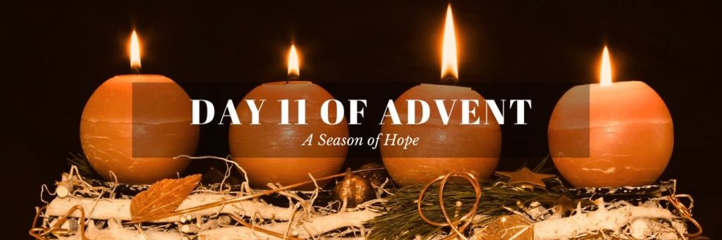Orange Advent decorations on wooden table